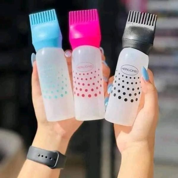 موزع زيت الشعر