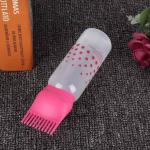 موزع زيت الشعر